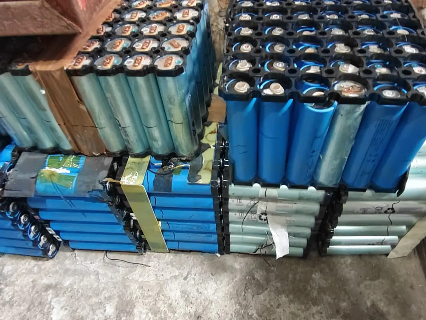 Rows of battery modules stacked on a pallet